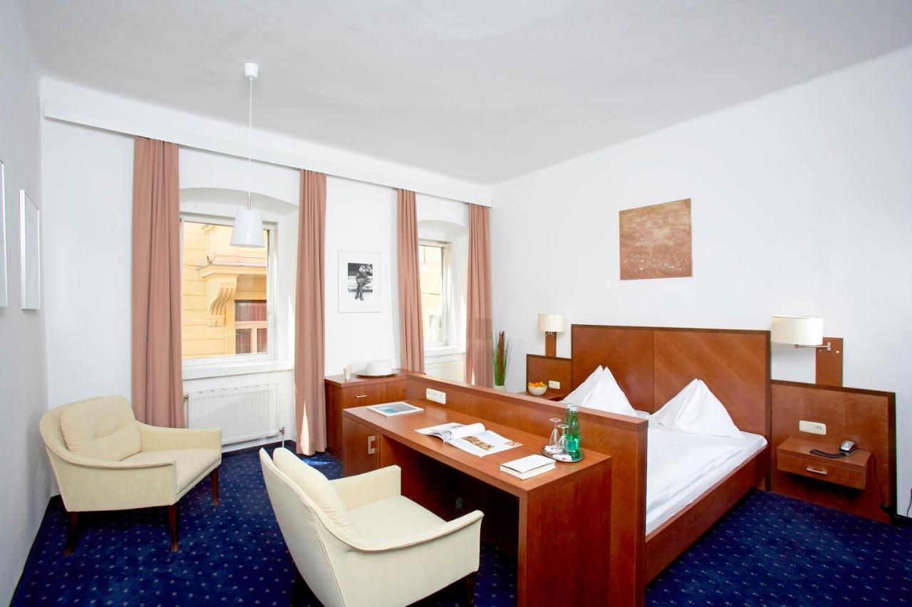 Keramikhotel Goldener Brunnen Gmunden Habitación foto